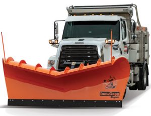 Truck with V shaped snow plow